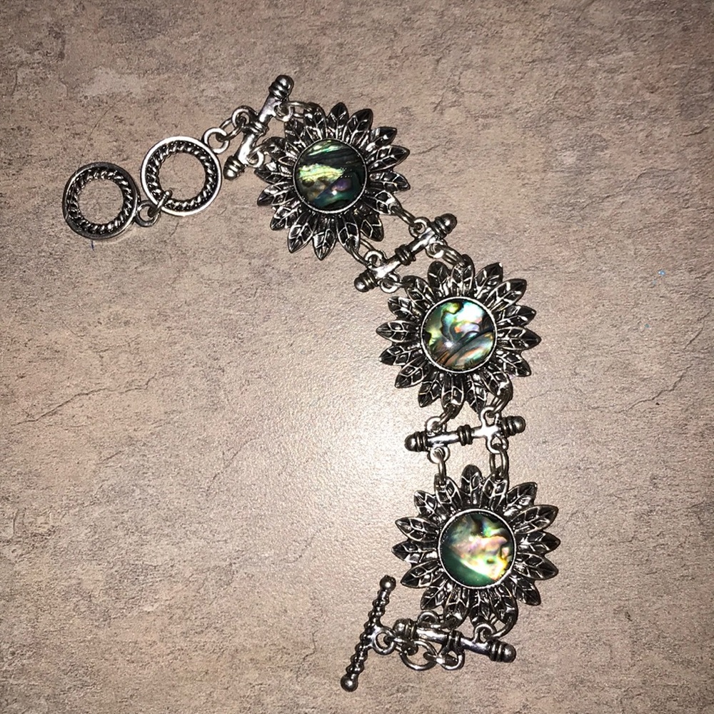 Silver tone and abalone bracelet like new